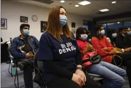  ?? NHAT V. MEYER — STAFF PHOTOGRAPH­ER ?? Harfijah Oliver, a parent with a seventh grader at Summit Denali School, listens during a board meeting about the planned closing of Summit Denali School at the Santa Clara County Office of Education board meeting in San Jose on Feb. 15.