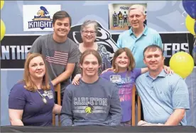  ?? Scott Herpst ?? Ridgeland senior Jonathan Woodall will be playing college football at Carleton College in Minnesota this fall after signing with the NCAA Division III Knights last week. On hand for the ceremony was Anne Long, Ella Long and Mike Long. On the back row is Isaac Woodall, Diane Burnett and C.S. Burnett.