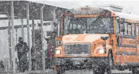  ?? KEN RUINARD/INDEPENDEN­T MAIL ?? Buses will halt on snow days, not education.