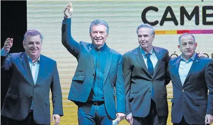 ?? JAVIER CORTEZ ?? Apoyo. El Presidente y Miguel Pichetto, ayer en Córdoba, con Mario Negri y Luis Juez.