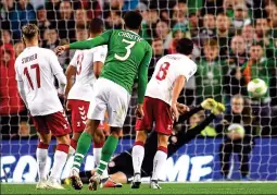  ??  ?? AS GOOD AS IT GOT: Republic of Ireland’s Cyrus Christie has a shot on the Denmark goal from outside the box late on