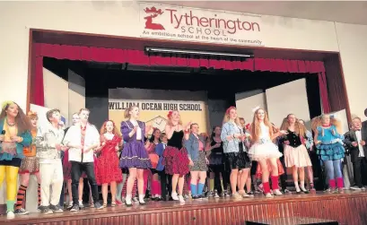  ??  ?? ●● Tytheringt­on School pupils performing their end of year production, Back To The 80s