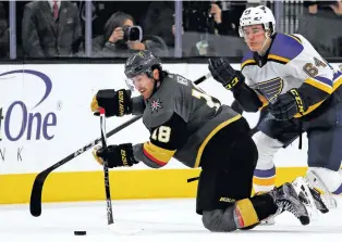  ?? ASSOCIATED PRESS FILE PHOTO ?? Golden Knights left wing James Neal, left, battles for the puck with Blues left wing Sammy Blais in October in Las Vegas, Nev. Neal is one of the proven players Vegas was able to pick up in its expansion draft, part of a core that has the team in...