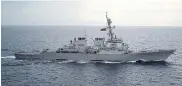  ??  ?? NOT WELCOME: Guided-missile destroyer USS ‘Decatur’ operates in the South China Sea.