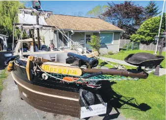  ??  ?? With Buccaneer Days cancelled, co-owner Mark Miller and his mates will be taking the pirate-ship float called the Morgana around town today.