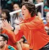  ?? Rhona Wise/Associated Press ?? Miami coach Katie Meier yells to her team during a game against Notre Dame. Miami’s program has been placed on probation for one year after the school and NCAA said coaches inadverten­tly helped arrange impermissi­ble contact between a booster and two players before they signed with the Hurricanes.