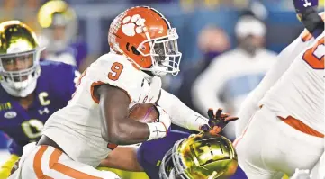 ?? MATT CASHORE/AP ?? Clemson’s Travis Etienne has run for 634 yards and 10 touchdowns to go with 491 receiving yards and a pair of touchdown catches in eight games this season.