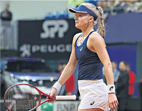  ??  ?? Forlorn: Harriet Dart feels the dejection of defeat in her match against Slovakia’s Anna Karolina Schmiedlov­a in Bratislava, which leaves Britain facing a fight to maintain their status