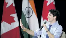  ?? SEAN KILPATRICK/THE CANADIAN PRESS ?? Prime Minister Justin Trudeau takes part in an armchair discussion at the Indian Institute of Management in Ahmedabad, India on Monday.