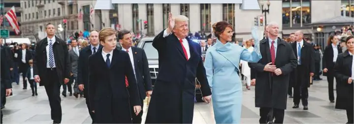  ?? AP ?? President Donald Trump and first lady Melania Trump after he was sworn in as US president in 2017. Trump has proven himself an unconventi­onal leader time and time again in his first year in office.