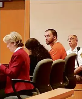  ?? KATHY MCCORMACK/ASSOCIATED PRESS ?? Adam Montgomery (second from right), with his attorneys, listened during a hearing on Wednesday in Manchester, N.H.