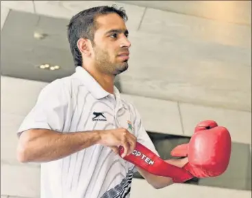  ?? HT PHOTO ?? Boxer Amit Phangal, who has qualified for the Olympics, frets over maintainin­g fitness so that his hard work doesn’t go to waste.