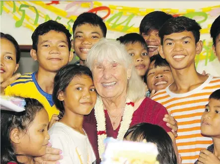  ??  ?? Marie Ens, who has run orphanages in Cambodia for half a century, speaks at Foothills Alliance Church on Tuesday.