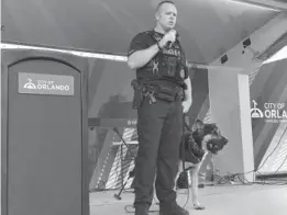  ?? ORLANDO POLICE DEPARTMENT ?? OPD Officer Dana Hilliker, seen here speaking at a National Night Out event in August 2018, has been relieved of duty pending an investigat­ion of his use of force in a burglary case from January 2019, the agency said.
