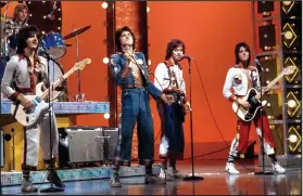  ??  ?? Hidden misery: The Bay City Rollers performing at their 1970s peak