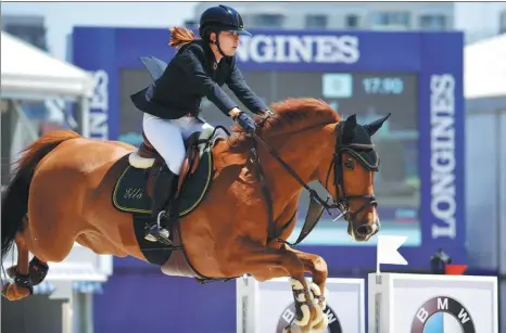  ?? PROVIDED TO CHINA DAILY ?? Chinese teenager Ella Wang competes at the Longines Global Champions Tour show jumping event last weekend in Shanghai. Wang is one of the nation’s next wave of young riders trying to catch up with the world’s best in the sport.