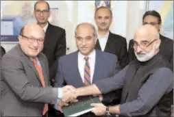  ?? -APP ?? Secretary Petroleum, Mian Asad Hayauddin and DG PC, Imran Ahmed signed the PCA & EL for Taung Block on behalf of govt with CEO POL, Shuaib A. Malik, at Petroleum Division.