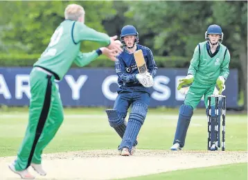  ??  ?? Forfarshir­e’s Callum Garden opens the batting for Scotland against Ireland.