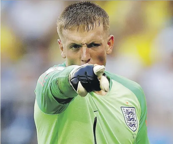  ?? THE ASSOCIATED PRESS ?? England goalie Jordan Pickford produced highlight reel saves in back-to-back wins over Colombia and Sweden, and he’ll have to maintain his brilliant play under enormous pressure if the Three Lions are to beat Croatia on Wednesday to advance to the...