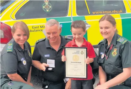  ??  ?? Kyran Duff, with the emergency response team and, right, with mum Nicola Jenkins