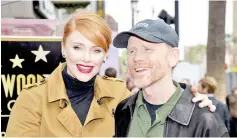  ??  ?? Ron Howard poses with his daughter Bryce Dallas after he was honoured with the 2,568th star on the Hollywood Walk of Fame. — Reuters file photo