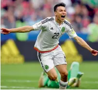  ?? AP ?? Mexico’s Hirving Lozano celebrates after scoring his side’s second goal against Russia in Kazan on Saturday. —