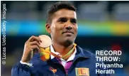  ??  ?? RECORD THROW: Priyantha Herath