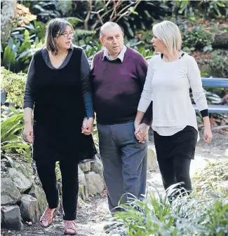  ?? Photo: KEVIN STENT/FAIRFAX NZ ?? Kaye Stewart’s family near the bench they erected as a memorial to her in the Wellington Botanical Gardens. Husband Bob is with their twin daughters, Tanya Stewart, left, and Jane Galanakis.