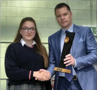  ??  ?? Coláiste Chill Mhantáin Sixth Year student Arnomeda Jankauskai­te, winner of the annual Millen Varghese Photograph­y Competitio­n which honours the memory of former student, Millen Varghese. Arnomeda was presented with her award by Deputy Principal Oliver...