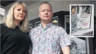  ?? PHOTOS: ADAM BURNS ?? Hard to break . . . Jamies Jewellers owners Rachel and Clyde Vellacott assess the damage following an attempted burglary on Tuesday. Inset: The aftermath of the attempted burglary.