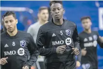  ?? DAVE SIDAWAY ?? New Impact midfielder Saphir Taïder, left, and defender Zakaria Diallo were practising at Olympic Stadium Thursday as the team returned to Montreal following an eight-day training camp in Miami.