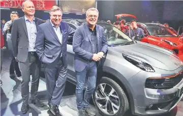  ??  ?? (From left) Mats Fagerhag, CEO of China Euro Vehicle Technology AB, Peter Horbury, Executive Vice President of Geely Design, and Alain Visser, Senior Vice President of Lynk & Co, during a media event at Ningbo Internatio­nal Speedway. — Reuters photo