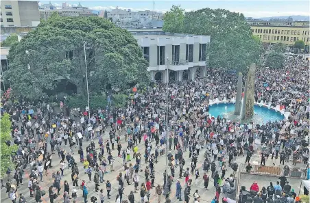  ??  ?? Thousands of people filled Centennial Square and spilled onto surroundin­g streets on Sunday for the Peace Rally for Black Lives.