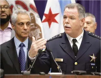  ?? AP FILE PHOTO ?? Mayor Rahm Emanuel (left) and Police Supt. Garry McCarthy appear at a news conference in November 2015 to announce first-degree murder charges against Police Officer Jason Van Dyke.