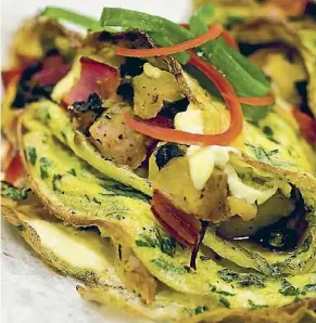  ?? STUFF ?? An omelette filled with vegetables and herbs is a great gluten-free breakfast.