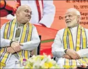  ?? HT FILE ?? BJP chief Amit Shah and PM Narendra Modi during party’s executive meet last week. In a video interactio­n with party workers, Modi said the wind was blowing in the BJP’s favour.