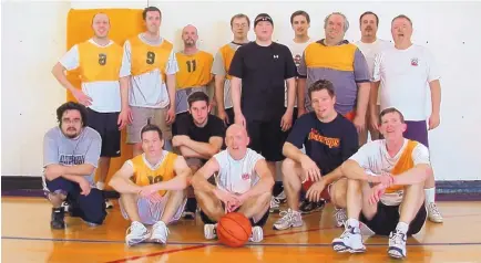  ?? HAROLD SMITH ?? Here’s a photo following a weekly Journal basketball pickup game from early 2009. Top row (from left): Jeremy Steiner, Mark Ralkowski, Christian Wood, James Staley, James Coffey, Adam Drey, Jim Goodman, Jim Brown, Dennis Latta. Middle row: James Barron, Sean Sullivan, Will Webber. Bottom row: Adam Shadoff, Randy Harrison, Ken Sickenger.