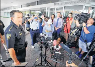  ?? AP PHOTO ?? Jacksonvil­le Sheriff Mike Williams addresses the media across the street from the scene of a multiple shooting at The Jacksonvil­le Landing during a video game tournament, Sunday, in Jacksonvil­le, Fla.