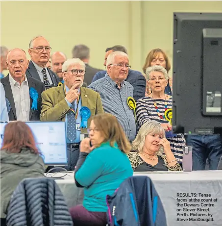  ?? ?? RESULTS: Tense faces at the count at the Dewars Centre on Glover Street, Perth. Pictures by Steve MacDougall.