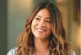  ?? ABC ?? Gina Rodriguez stars as a newspaper obituary writer who sees the ghosts of her subjects in “Not Dead Yet.”