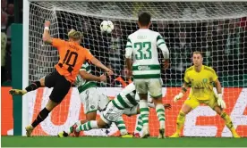 ?? Buchanan/AFP/Getty Images ?? Mykhaylo Mudryk scores Shakhtar Donetsk’s equaliser against Celtic. Photograph: Andy
