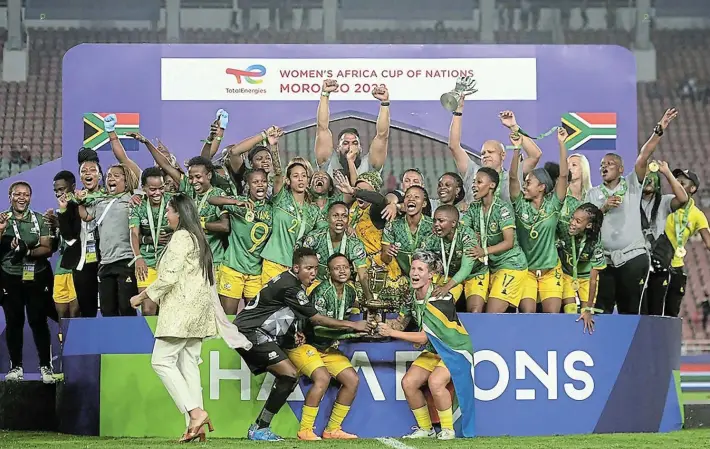  ?? Picture: BACKPAGEPI­X/RYAN WILKISKY ?? TOP OF CONTINENT: SA celebrates with the winner’s trophy after the 2022 Africa Cup of Nations final against Morocco at the Prince Moulay Abdellah Stadium in Rabat, Morocco, in July 2022.