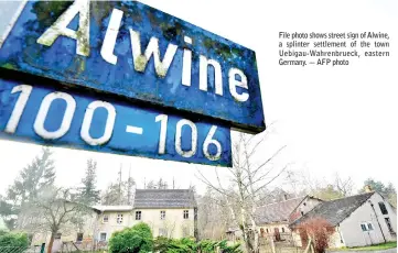  ??  ?? File photo shows street sign of Alwine, a splinter settlement of the town Uebigau-Wahrenbrue­ck, eastern Germany. — AFP photo