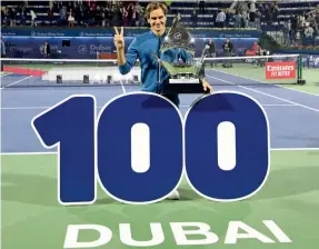  ??  ?? Attirer les plus grands joueurs, tel le tennisman suisse Roger Federer (à Dubaï en mars 2019), assure aux monarchies du Golfe une visibilité mondiale.