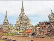  ?? Rosemary McClure ?? AYUTTHAYA, once the capital of Siam, features functionin­g temples and restored ruins. It’s about an hour from Bangkok.