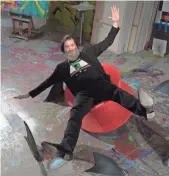  ?? DAN MACMEDAN, USA TODAY ?? Look, Ma! No hands! Carrey takes a spin around his sharkinfes­ted studio.