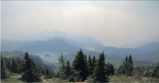  ??  ?? A screen capture taken from a Sunshine Village webcam shows smoke from nearby B.C. wildfires pushing closer to the resort. The lodge is still open but hiking trails are closed.