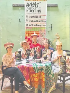  ??  ?? Ong (second left) together with festival directors Donald Tan (second right) and Marina FooTan (centre), as well as Aurelia Liu (left) and Marian Chin from the organising committee. All are wearing hats from Ong’s collection.