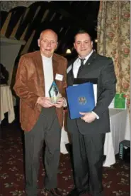  ?? SUBMITTED ?? Jerry Petersen, attorney and Chardon Area developer, holds the Legacy Award trophy recognizin­g his lifetime achievemen­t presented at the Chardon Area Chamber of Commerce at its recent Annual Meeting. Pictured with him is Chamber President Jonathan...