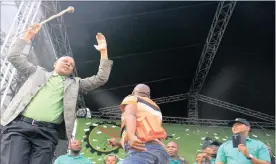  ?? PHOTO: NHLANHLA PHILLIPS ?? Joseph Mathunjwa, the president of Amcu, dances on stage in Marikana in commemorat­ion of the 34 miners who were killed four years ago.